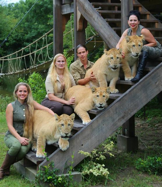 Animal trainers of the white liger cubs